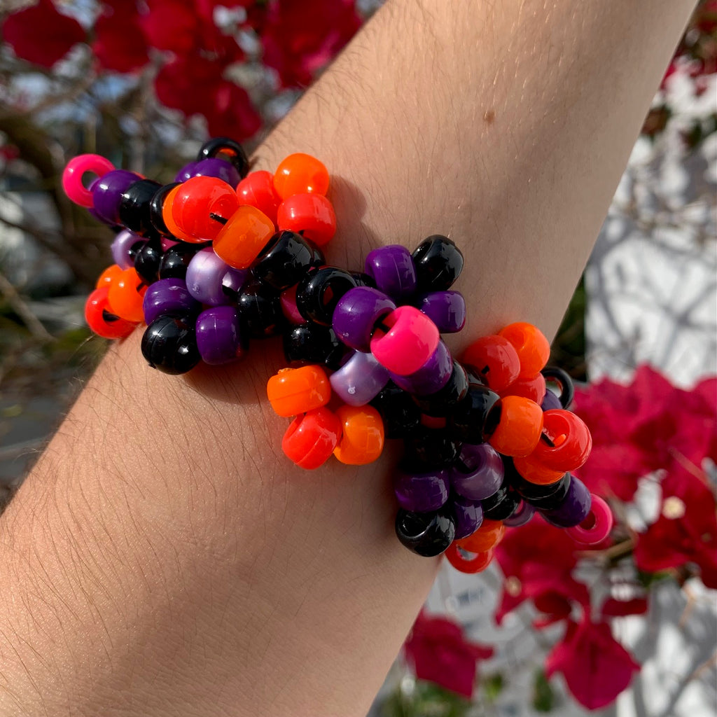 bright-colorful-Sagittarius-Extra-Spiky-rave-kandi-Cuff-zodiac-astrology-horoscope-fire-sign-magenta-red-orange-purple-black-jupiter-ruled-sign