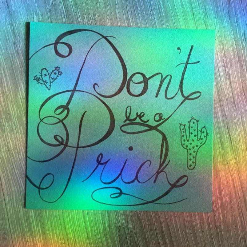 Don’t Be a Prick is an original work of art by Tori Arnold Art. The piece is a play on words, a pun, that says don't be a prick in fancy cursive calligraphy with cactuses drawn around the text. If you love the desert, Joshua Tree or just putting people in their place but in a nice cutesy kind of way then this piece is perfect for you!