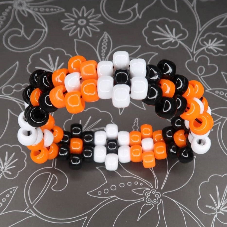 orange black and white spooky halloween horror film scream iv scary movie haunted house jack-o-lantern inspired kandi bracelet accessory