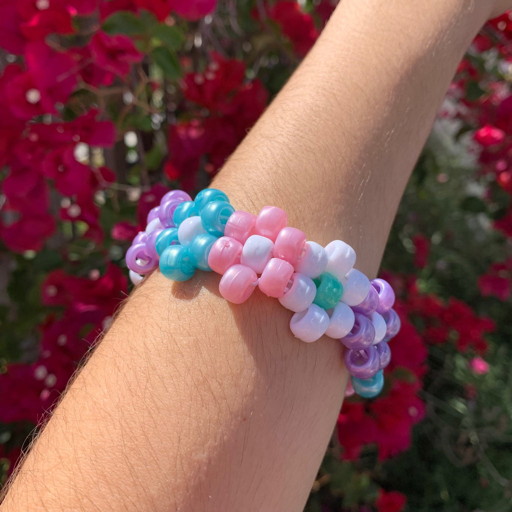 embrace your inner pastel fairy princess vibes with the taurus flower kandi cuff perfect for raves, music festivals or adding a little extra space to a casual, everyday look!